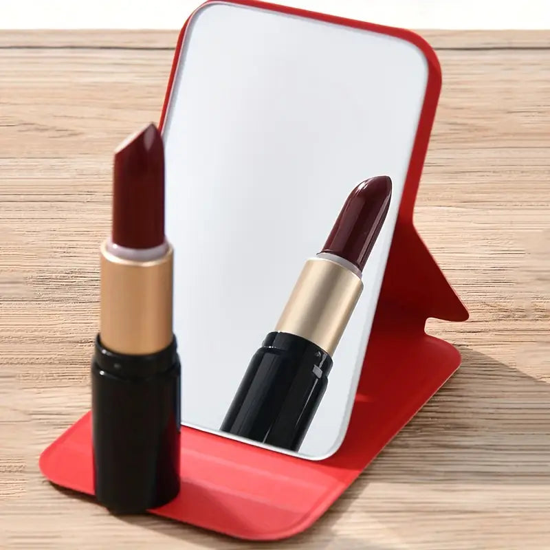 "Portable Folding Makeup Mirror - Compact & Shatterproof"